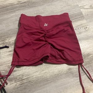 Pink muscle nation scrunch bum shorts